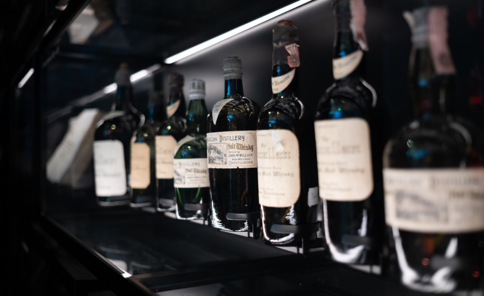 closeup of a fancy shelf of aged whiskey